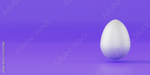 White Easter egg on purple background, minimal concept