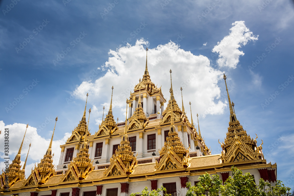 Fototapeta premium Roof of a temple in Thailand. Traditional Thai style pattern on the roof of a temple.