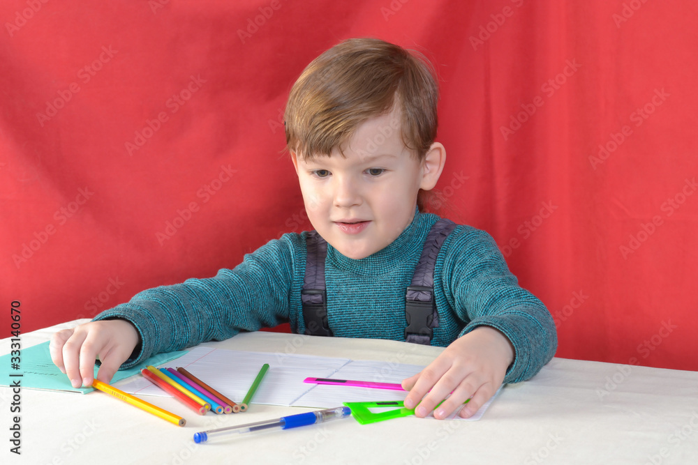 little boy drawing with color pencils little boy drawing with color pencils