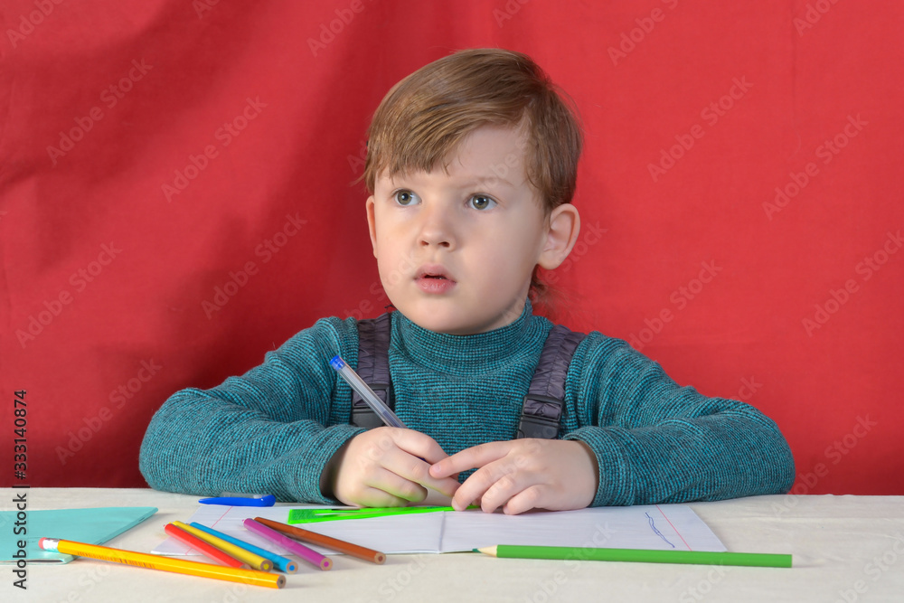 little boy drawing with color pencils little boy drawing with color pencils