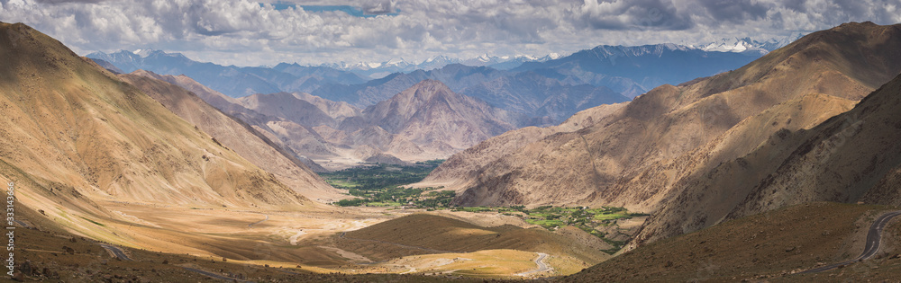 Panoramic view of Himalaya mountains landscape in Leh in summer or greeny season, Ladakh north India