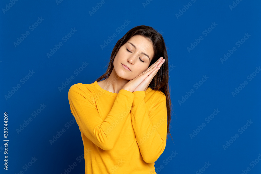 Brunette girl wearing a yellow T-shirt Brunette girl wearing a yellow T-shirt