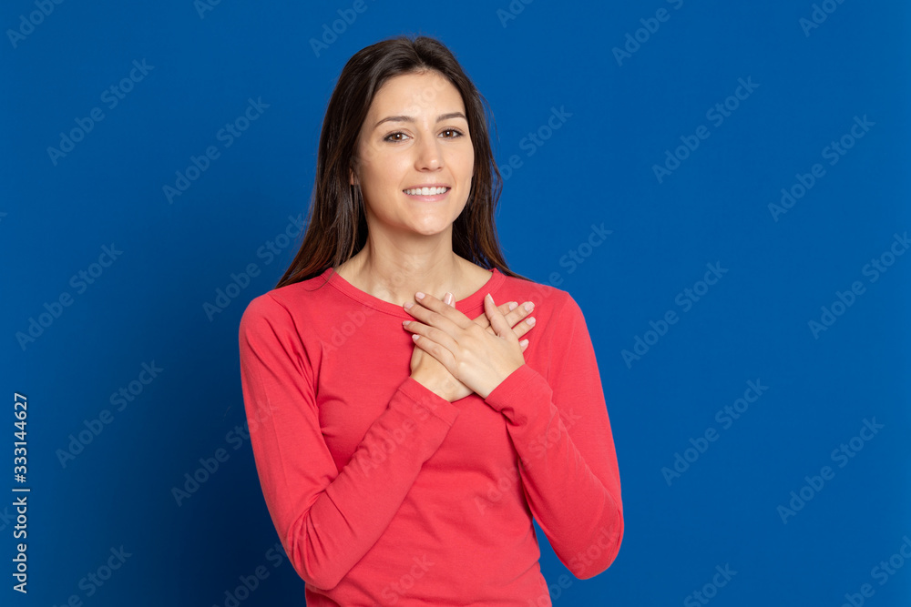 Attractive brunette girl wearing a red T-shirt Attractive brunette girl wearing a red T-shirt
