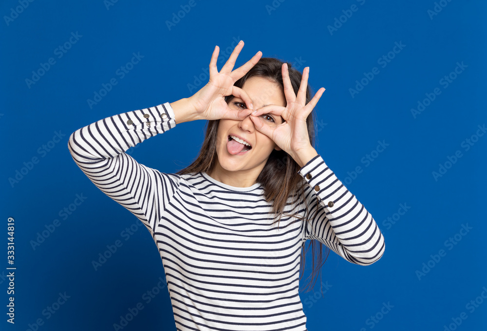 Brunette young woman wearing a striped T-shirt Brunette young woman wearing a striped T-shirt