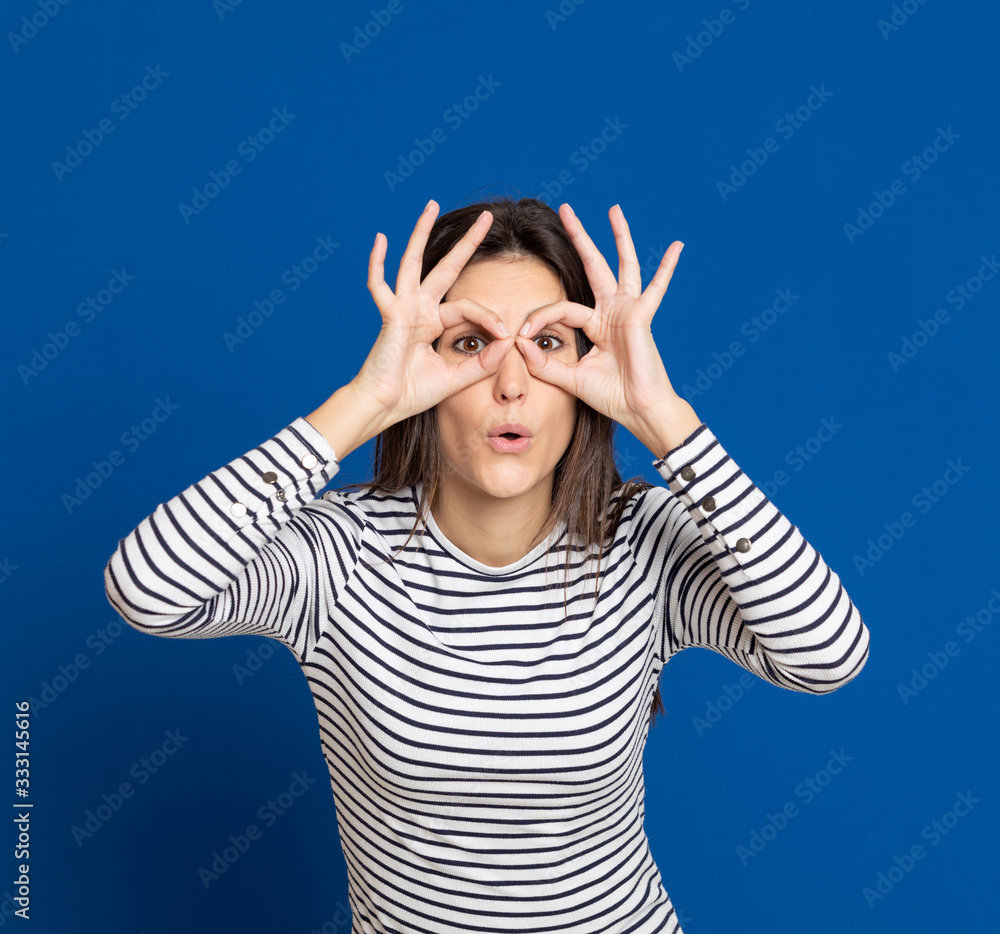 Brunette young woman wearing a striped T-shirt Brunette young woman wearing a striped T-shirt