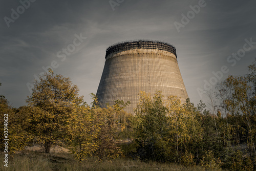 Cooling tower at abandoned construction site of blocks 5 and 6 of the Chernobyl nuclear power plant photo