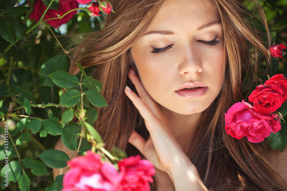 Beautiful woman portrait with roses. A young and attractive girl. Beautiful woman portrait with roses. A young and attractive girl.