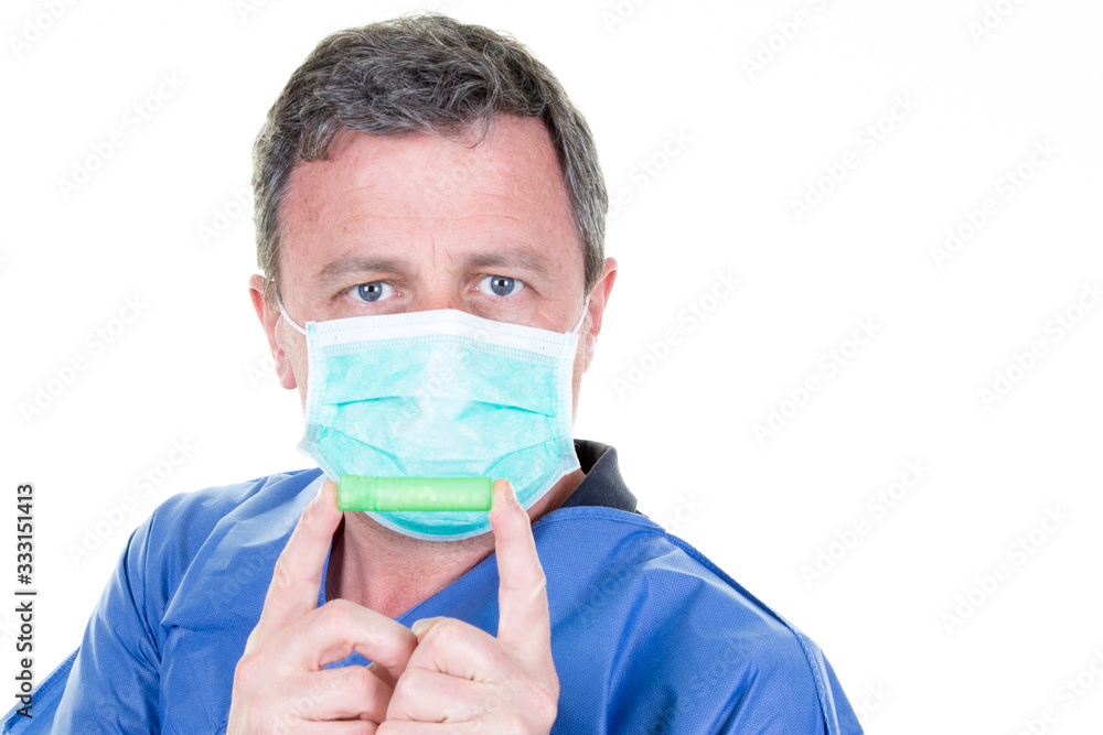 man home scientist holds green test tube virus coronavirus covid-19 man home scientist holds green test tube virus coronavirus covid-19