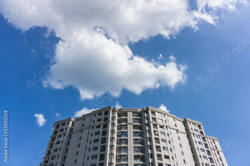  Residential area under blue sky and white clouds