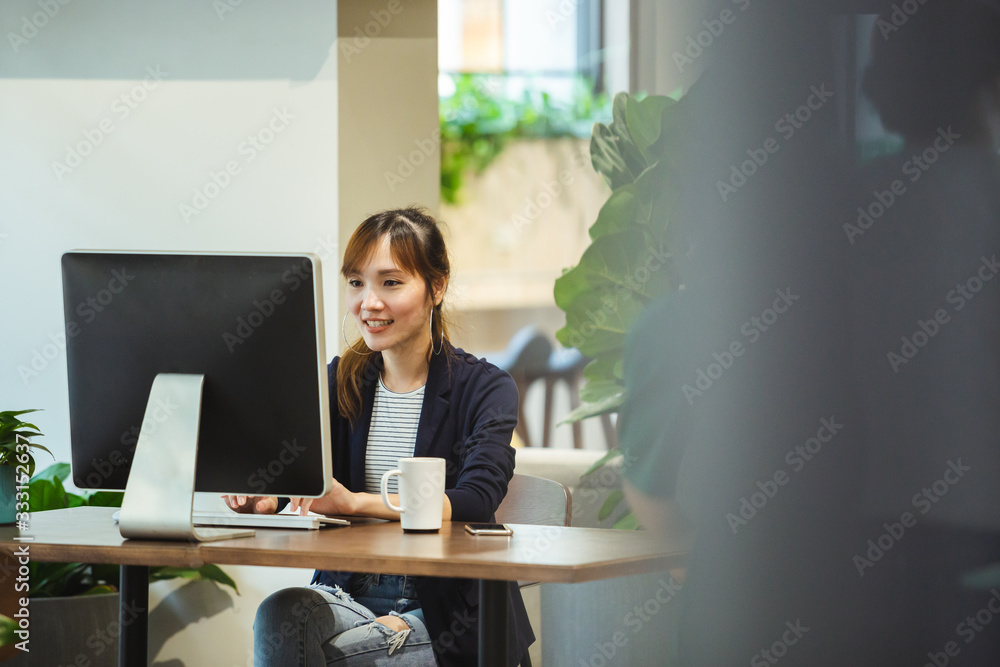 asian smart woman working with computer in work space cafe. asian smart woman working with computer in work space cafe.