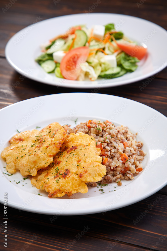 fried chicken breast with buckwheat and salad fried chicken breast with buckwheat and salad