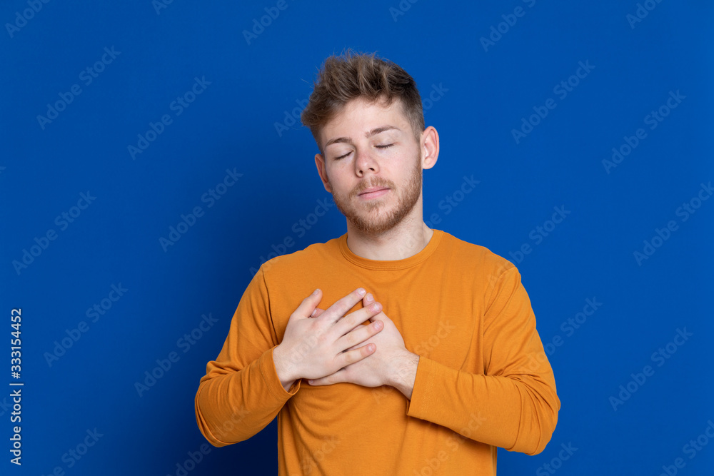 Attractive young guy with a yellow T-shirt Attractive young guy with a yellow T-shirt