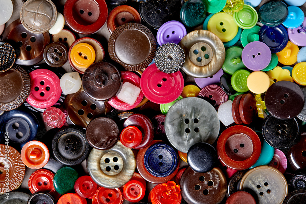 Background and texture of multicolored antique buttons Background and texture of multicolored antique buttons