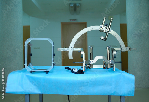Obraz na plátně Surgical equipment for implantation of a neurostimulator placed on table