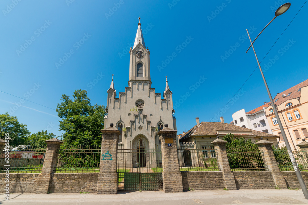 Novi Sad, Serbia - August 06, 2019: Reformed Christian Church in Novi Sad, Serbia. This religious building is also called Reformist-Calvinist church. Today’s building was built in 1865.