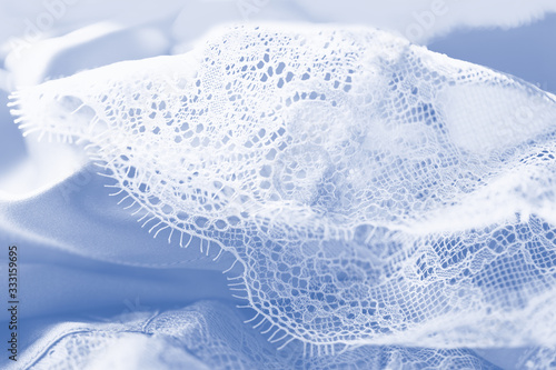 Pastel silk lace lingerie, blue gray color background