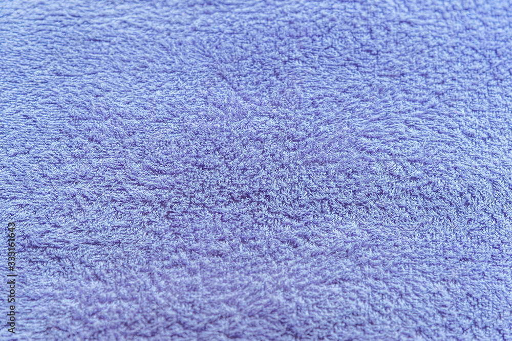 abstract background of bright purple terry towel close up abstract background of bright purple terry towel close up