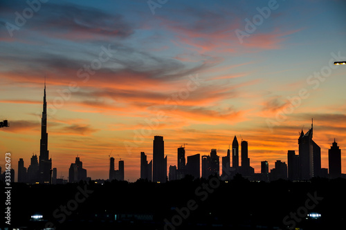 Dubai skyline silhouette after sunset 