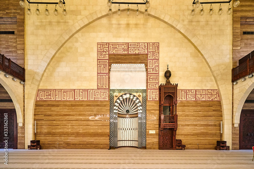 Traditional Mihrab in a muslim mosque photo