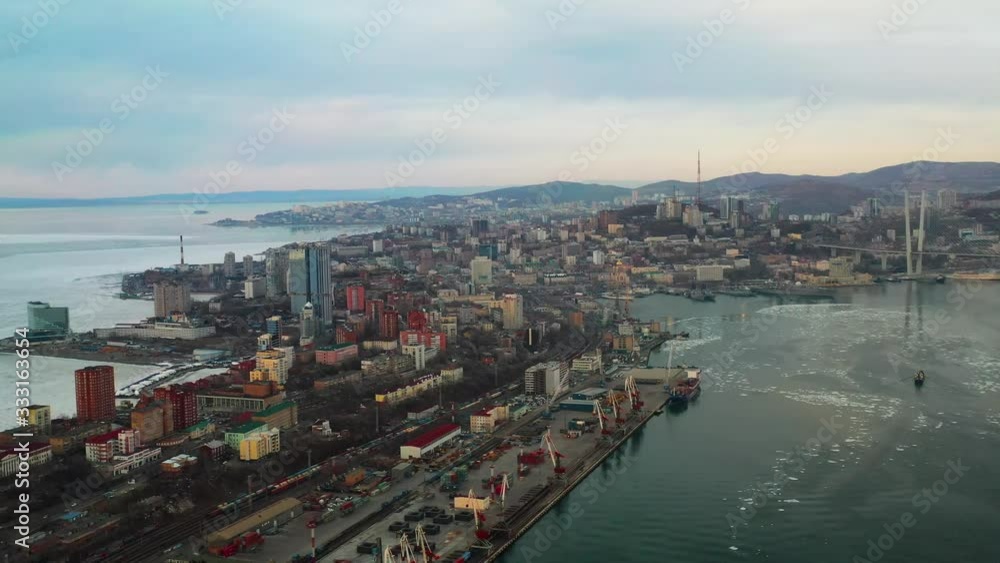 Panorama of the city landscape with a view of the sunset. Vladivostok, Russia Panorama of the city landscape with a view of the sunset. Vladivostok, Russia