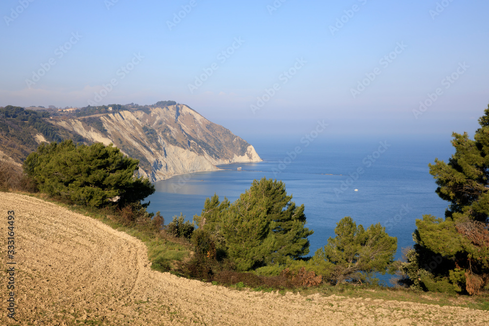 Ancona, Italy - January 1, 2019: View of Mezzavalle beach, Riviera del Conero, Adriatic Sea, Ancona, Marche, Italy Ancona, Italy - January 1, 2019: View of Mezzavalle beach, Riviera del Conero, Adriatic Sea, Ancona, Marche, Italy