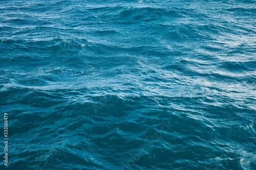 Splashing sea waves. Water surface wallpaper or background concept © Philipp Berezhnoy