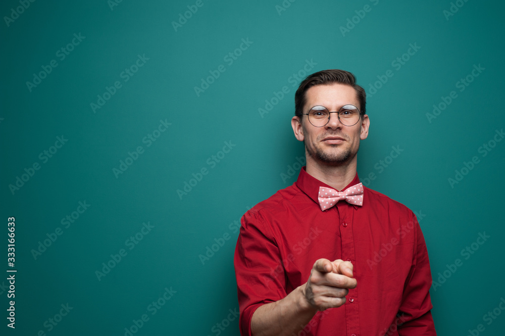 Portrait of positive young male hipster looking at camera Portrait of positive young male hipster looking at camera