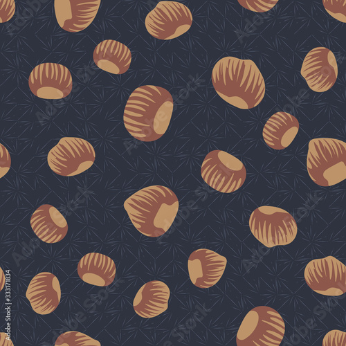 Tossed hazelnuts seamless vector pattern on dark background. Woodland food surface print design. For fabrics, stationery and packaging.
