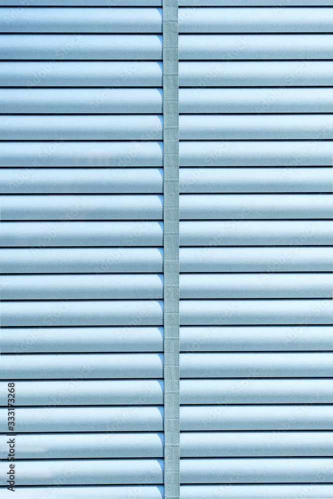 Window shutters or blinds texture background. Creative blue blinds. Creative, beautiful backdrop image. Modern jalousie design. Home window decor Window shutters or blinds texture background. Creative blue blinds. Creative, beautiful backdrop image. Modern jalousie design. Home window decor