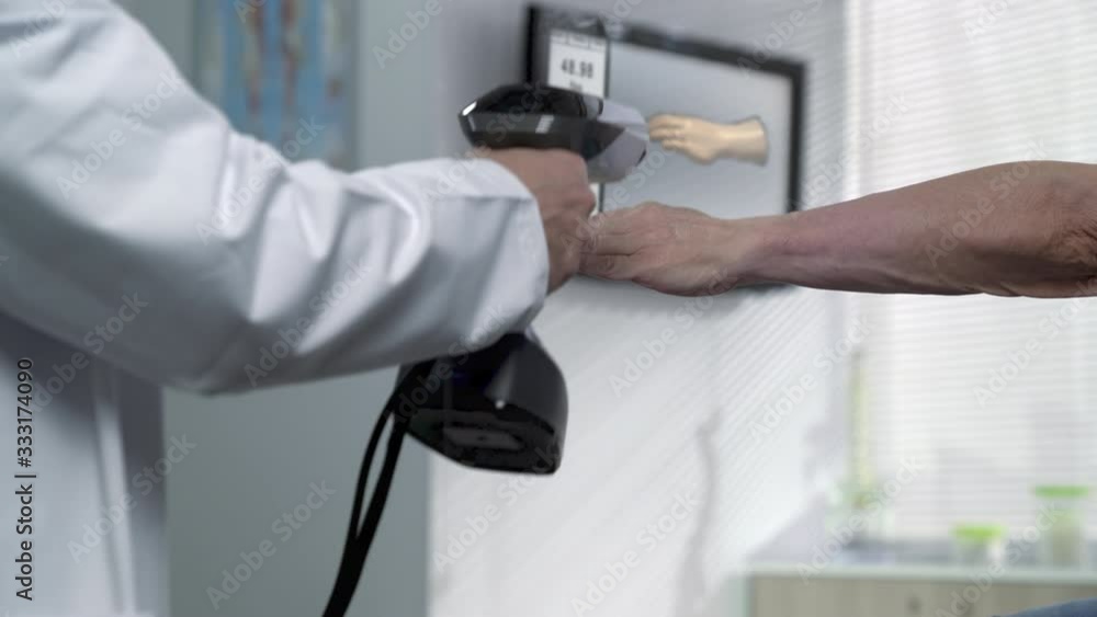 Hand scanner 3d technology,doctor scanning patient hand to acquire data for medical purpose Hand scanner 3d technology,doctor scanning patient hand to acquire data for medical purpose