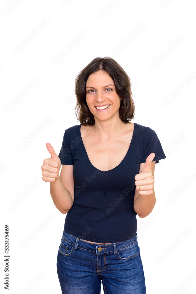 Studio shot of happy woman giving thumbs up isolated against white background Studio shot of happy woman giving thumbs up isolated against white background