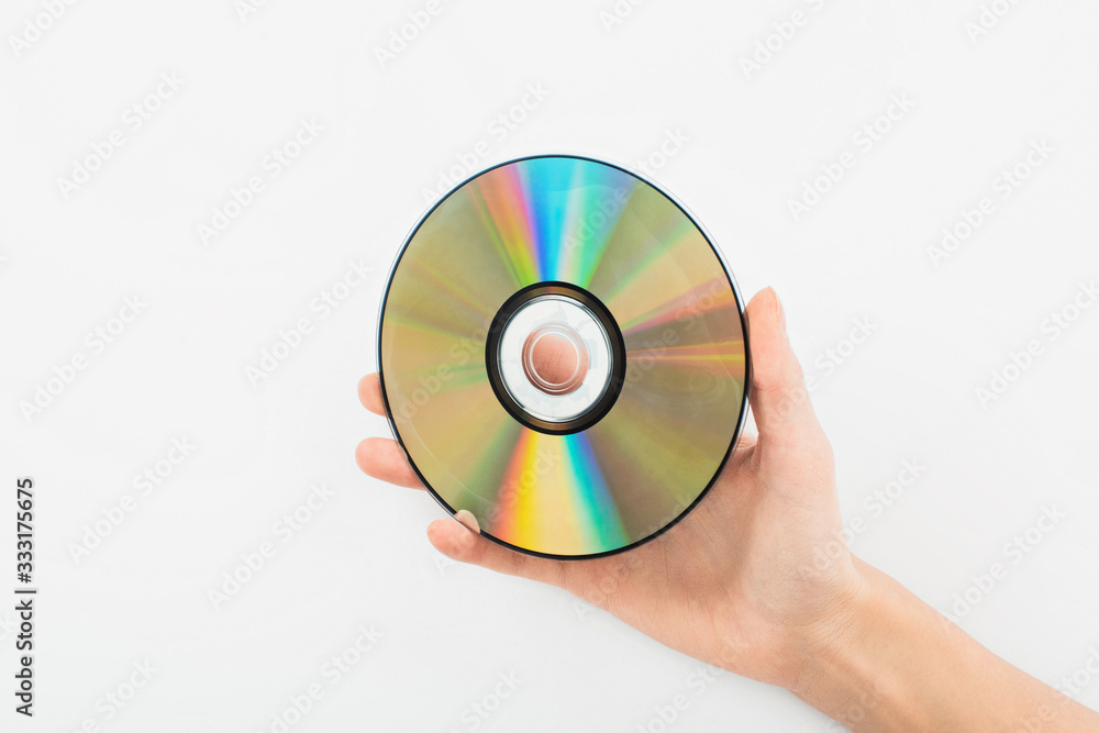 partial view of man holding CD disc on white background partial view of man holding CD disc on white background