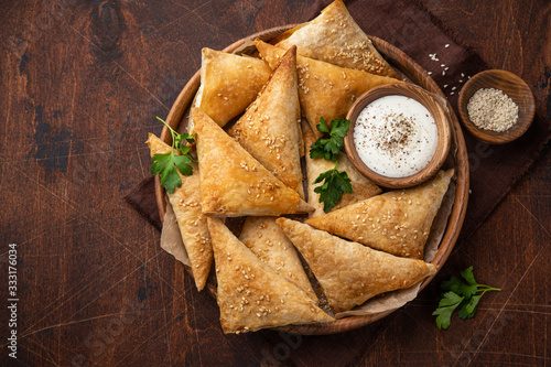 Photos Freshly  baked samosa pasties with meat