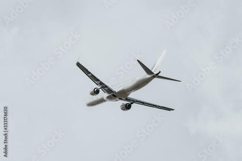 Image of Airplane taking off and barbed wire. Representing flight restrictions. 