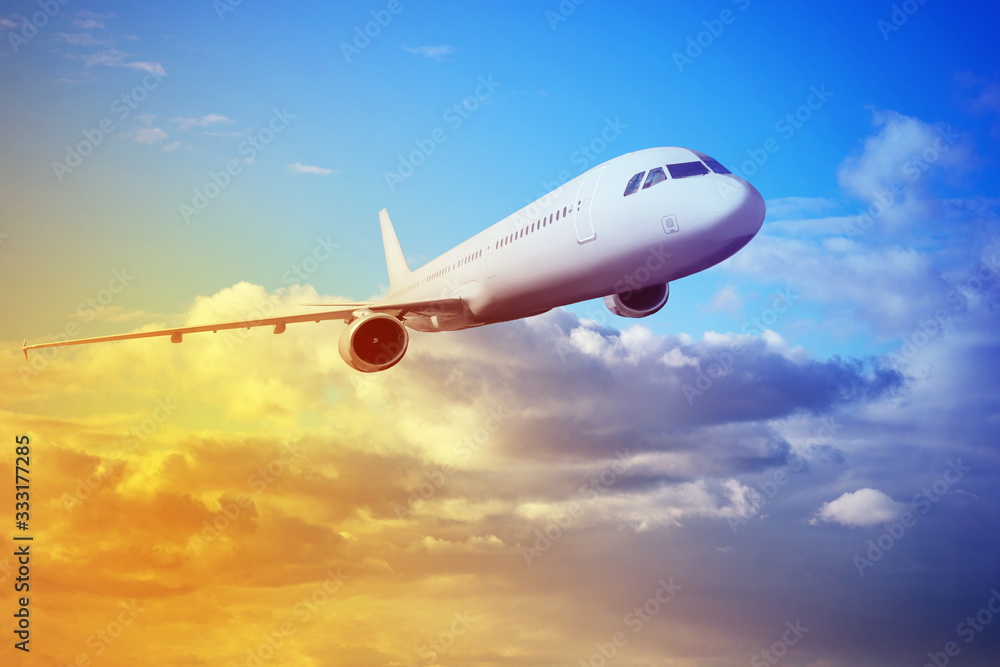 the plane is flying in the blue sky the plane is flying in the blue sky