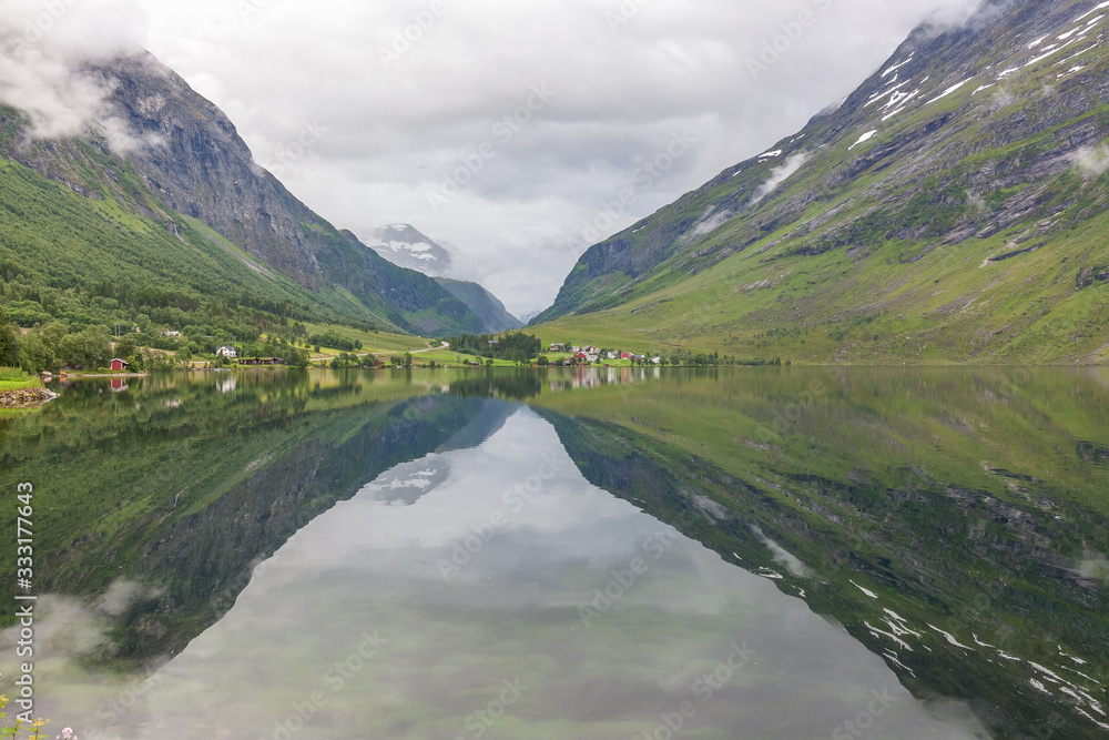 End of fjord. Beautiful Norwegian landscape. view of the fjords. Norway ideal fjord reflection in clear water selective focus