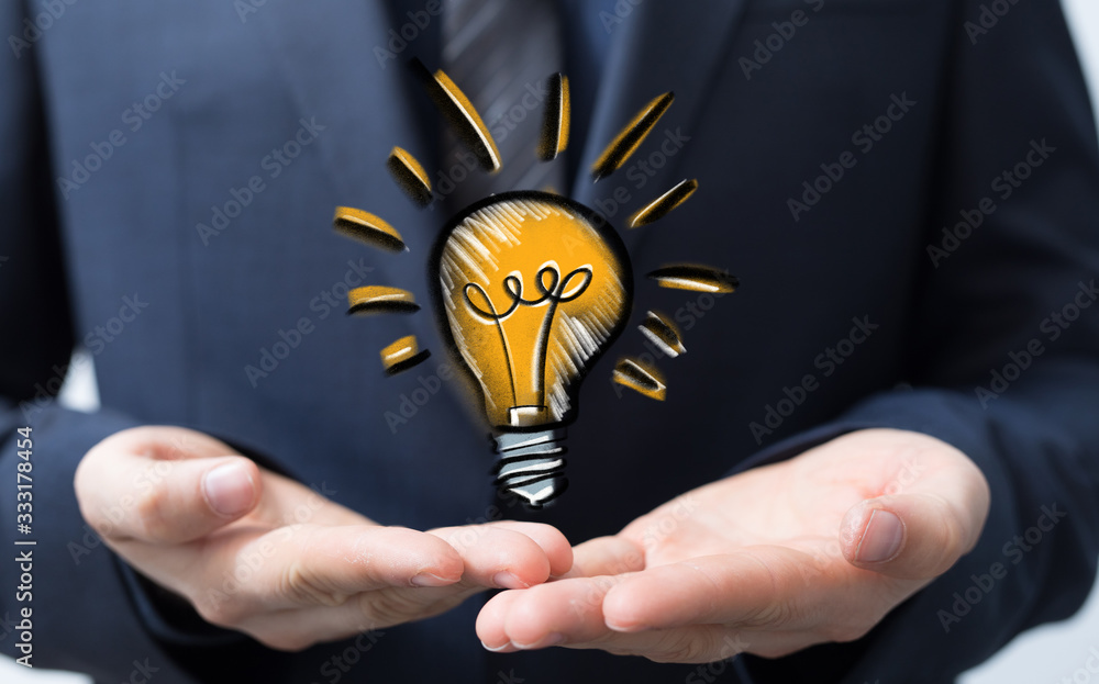 idea lamp concept in hand.