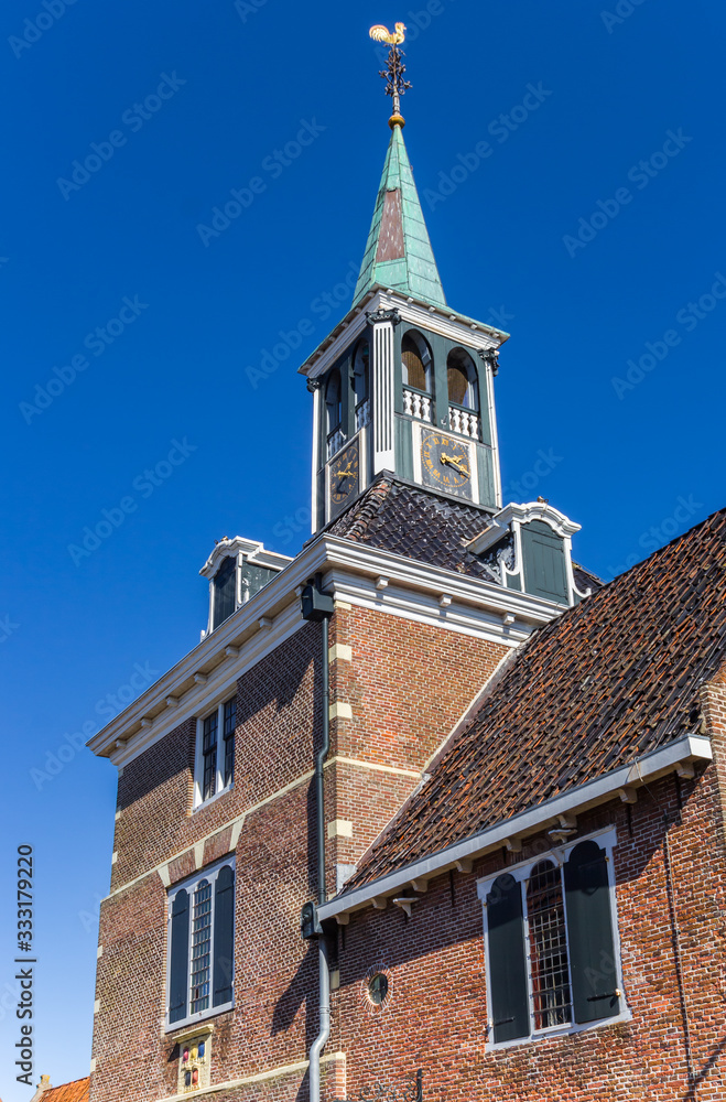 Tower of the historic weigh house in Frisian village Makkum, Netherlands
