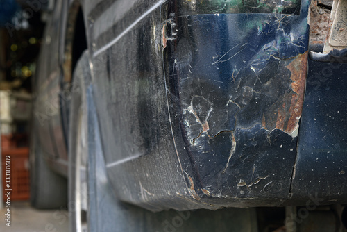 The color of the car is peeling off due to severe collisions.