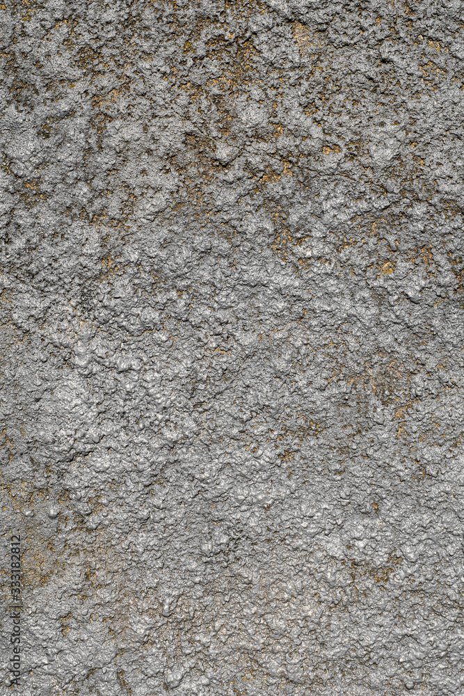 Fototapeta premium Natural natural texture of concrete with gray and gold stucco in macro shot