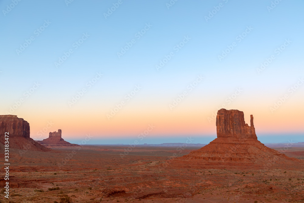 Beautiful sunset over famous Buttes of Monument Valley on the border between Arizona and Utah, USA Beautiful sunset over famous Buttes of Monument Valley on the border between Arizona and Utah, USA