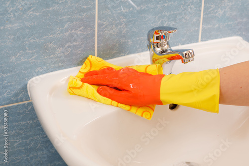 cleaning, disinfection, hands in rubber gloves