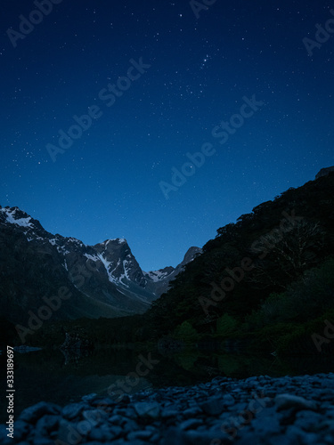 stars over snowcapped mountains by lake mackenzie in new zealand © Per