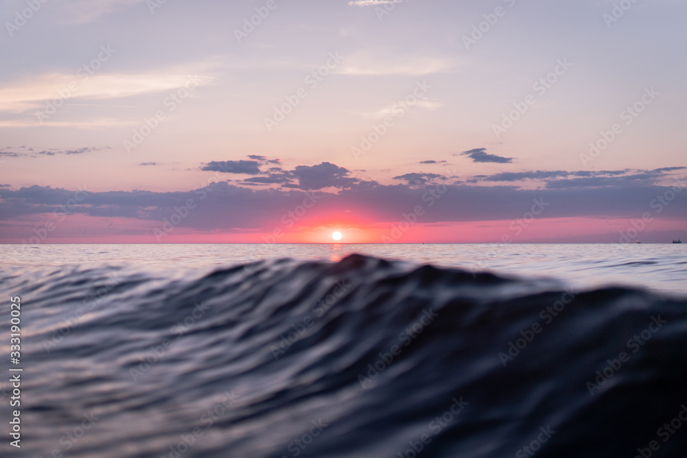 Waves in beautiful sunset light