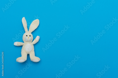 Toy Bunny On Blue Background. World Autism Awareness