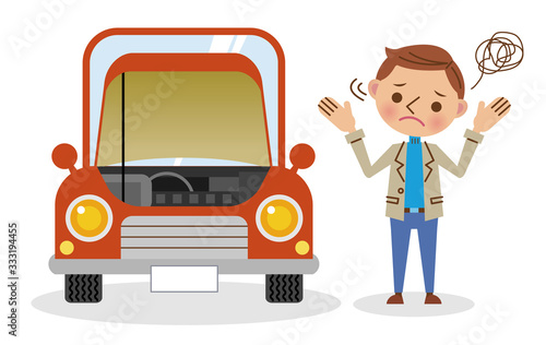 故障した車と困っている男性ドライバー