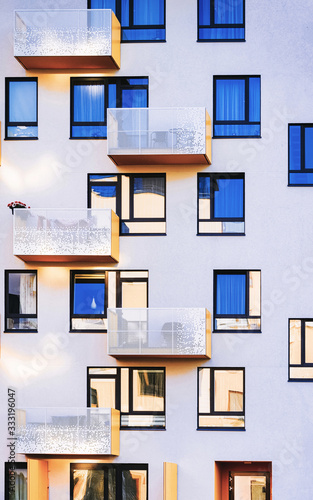 Facade with Windows of Modern residential apartment and flat building