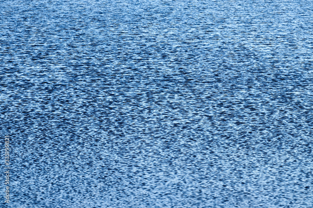 Blue Tones Water Waves Surface as Background. Blue Tones Water Waves Surface as Background.