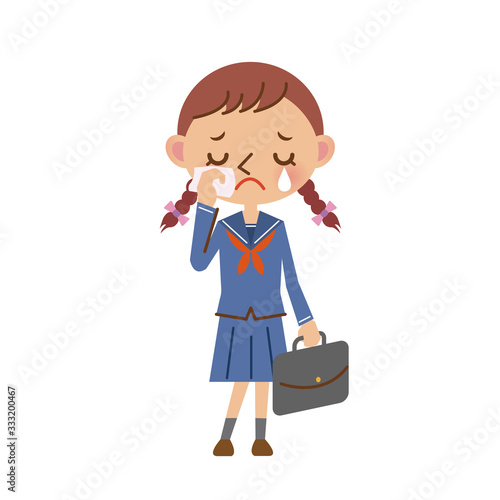 涙を流して泣くセーラー服姿の女子中学生・高校生