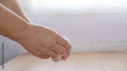 Wallpaper Mural Closeup Man Using Bottle of Antibacterial Wash Hand Sanitizer Torontodigital.ca